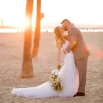 Jaclyn and Cody Beach Wedding-Kiss Under Sunset